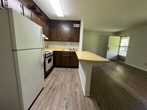 Building Photo - East Edge Apartments – Cozy, Wooded Community