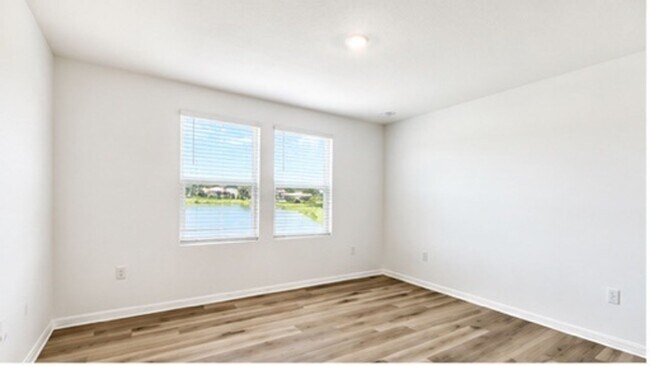 Building Photo - AVAILABLE NOW! 3/2.5 Townhome For Rent in Bellalago!