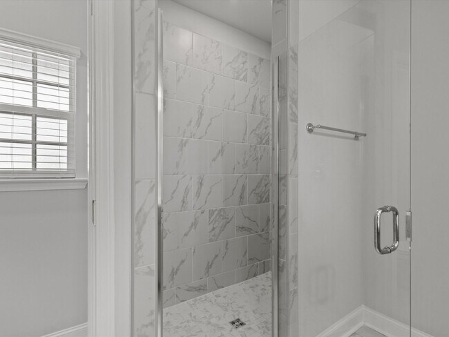 Building Photo - 3 Car Garage! Modern end-unit townhome located in the desirable Clift Farm!