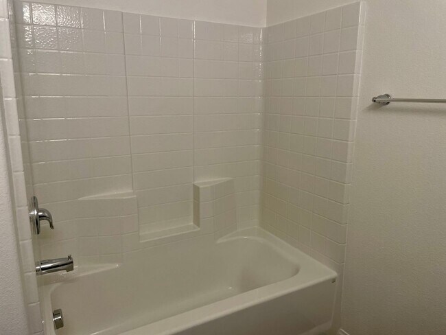 Building Photo - 3 bed 2 bath 2 car garage Townhome "On the Strip" South Las Vegas Blvd