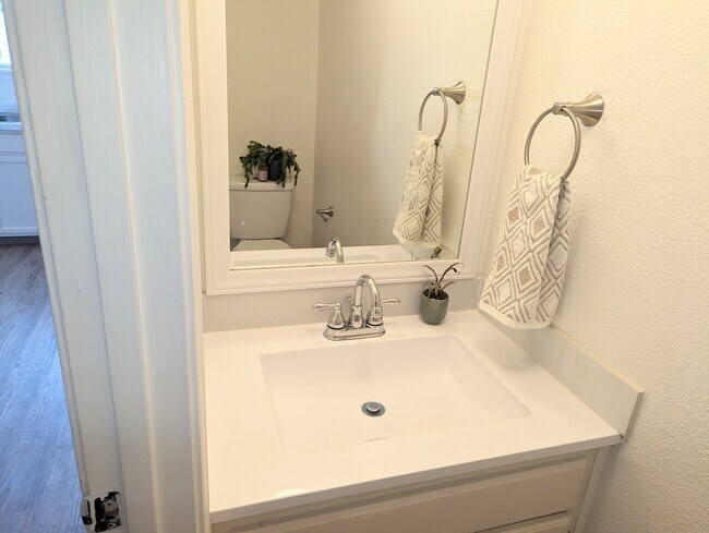 Half bath off of the kitchen - 823 Spring Ct