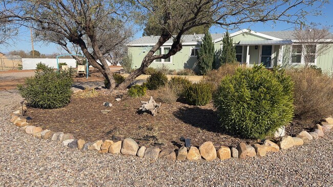 Building Photo - Fully Fenced Gorgeous Acre Property