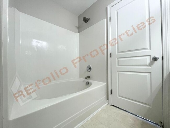Building Photo - Fresh Paint Interior! Lovely 3 Bedroom 2.5...