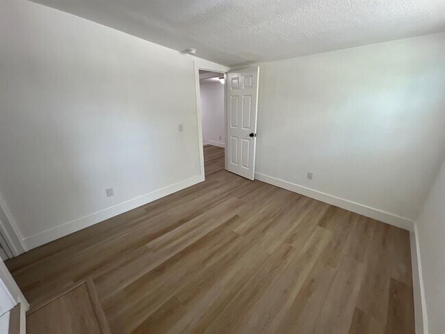 Building Photo - 10540 NW 28th Ave