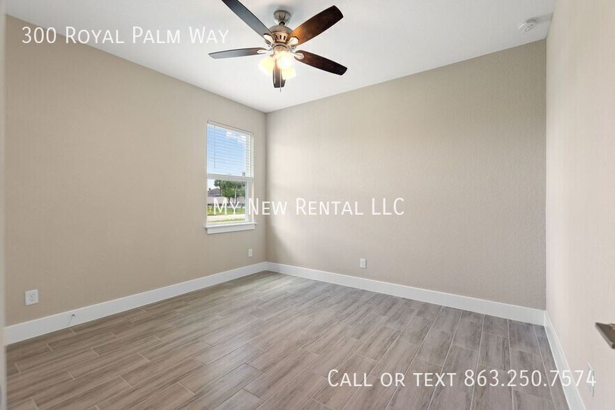 Building Photo - 300 Royal Palm Wy