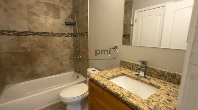 Building Photo - 1031 W 59th Pl