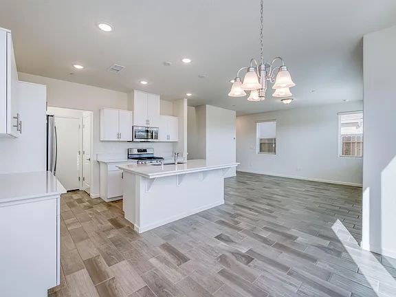 Building Photo - NEW! Modern, Wilson Home. 3 bedrooms / 2.5-bathroom single-family home in a quiet gated community...