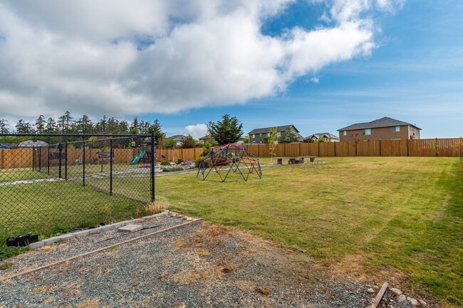 Building Photo - 4 Bedroom House in Gated Community