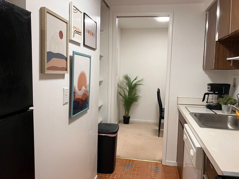 Full kitchen with microwave, dish washer, stove, coffee maker, utensils, pots & pans etc. - 8200 E Jefferson Ave