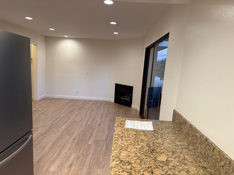 Living room view from kitchen - 10330 Riverside Dr