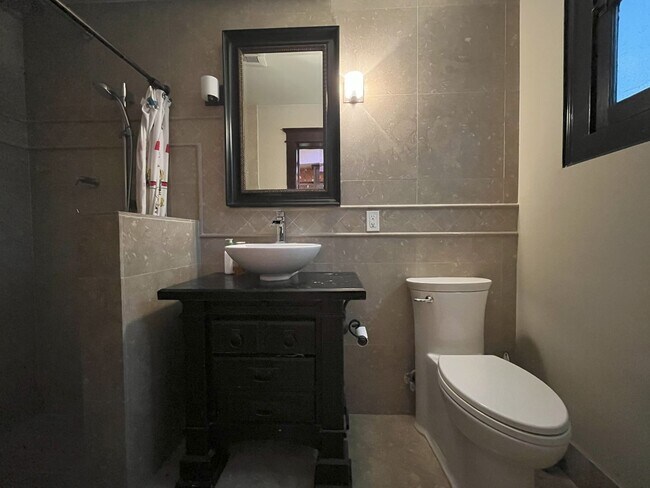 Building Photo - Charming NW Portland 1-Bedroom with Brick Accents & Modern Touches