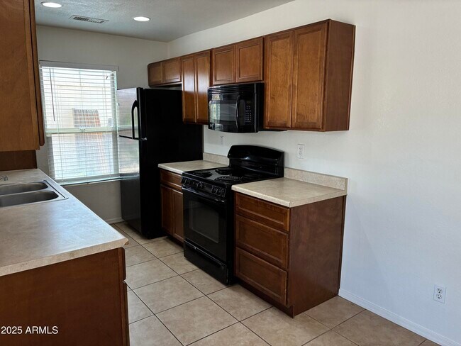 Building Photo - 11014 N 65th Ave