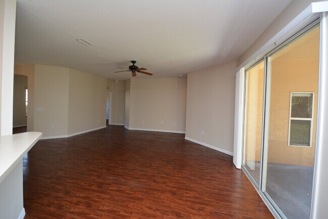 Building Photo - "Spacious 4-Bed Oasis in Palm Coast with 2...