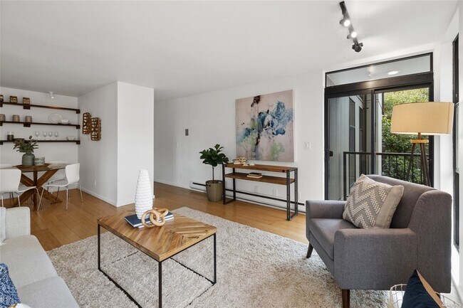 Sit on your couch and watch movies on a projection screen mounted on sturdy wooden shelving - 730 Bellevue Ave E