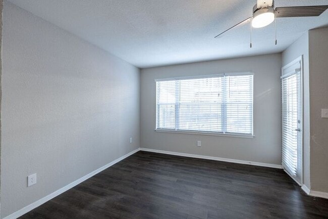 Building Photo - Spacious 2-Bedroom Elite Apartment with Private Balconies & Washer/Dryer