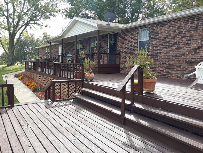 Building Photo - 4 bedroom 2 bath home, 2 car garage, SECLUDED AND PRIVATE, South FAY, 4 acres