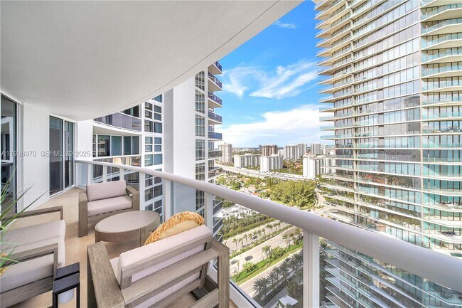 Building Photo - 18911 Collins Ave