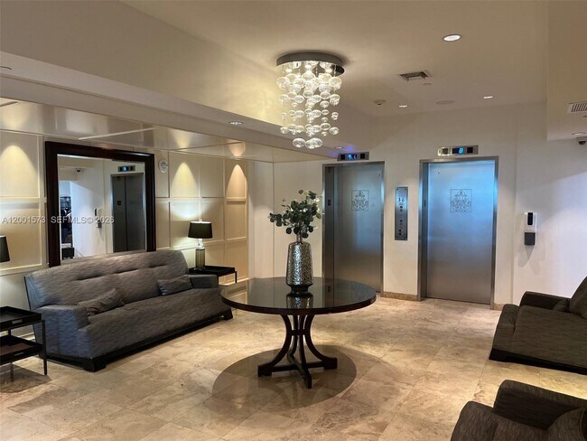 Building Photo - 9499 Collins Ave