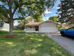 Building Photo - Updated Kitchen, carpet and freshly 3 bedr...