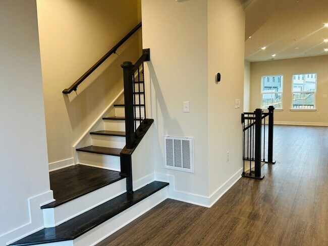 Building Photo - New Construction • 4 BR • 2 Full / 2 Half BA • End Unit Townhome in Village Town – Fayetteville’s...