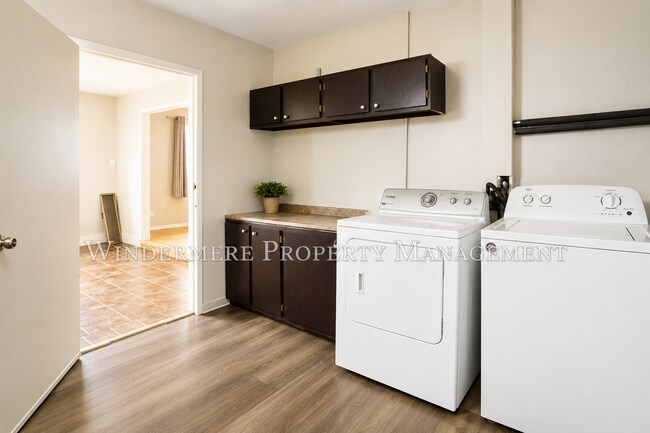 Building Photo - Three Bed Rambler on large fenced corner lot with patio