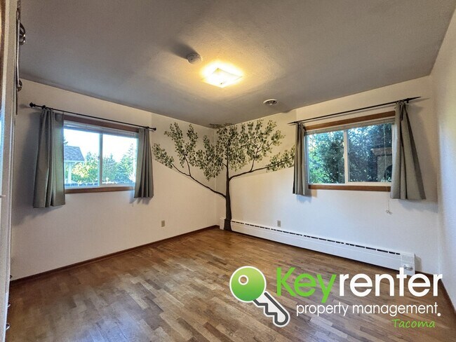 Building Photo - Charming 4-Bedroom Mid-Century Style Craft...