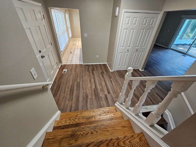 Building Photo - Private 4 Bedroom Home on 0.75 Acres with Great Room Fireplace, Wet Bar & 3-Season Room, 2 Car At...