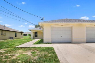 Building Photo - Beautifully updated duplex two bedrooms+ DEN, two bath in Cape Coral