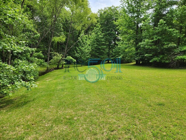 Building Photo - RARE exquisite home on acreage in the heart of West Little Rock!