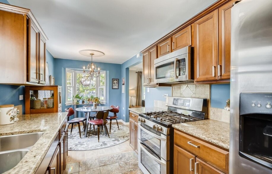 Kitchen has been updated, see additional photos. - 5701 E 28th Ave