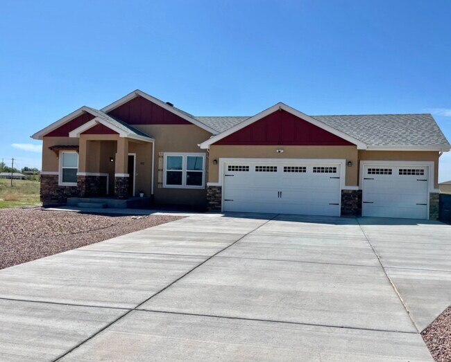 Building Photo - Stunning 3-Bed Ranch with 3-Car Garage & RV Parking in Pueblo West