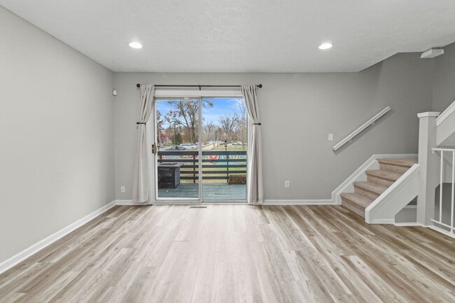 Building Photo - Broad Ripple townhome with garage, updated kitchen, and walkable convenience!