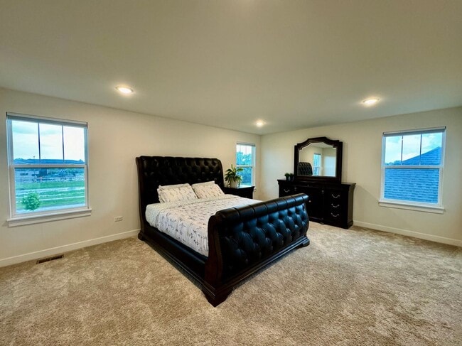 Building Photo - Newly Built 5-bedroom featuring luxe finishes and a spa-inspired master suite.