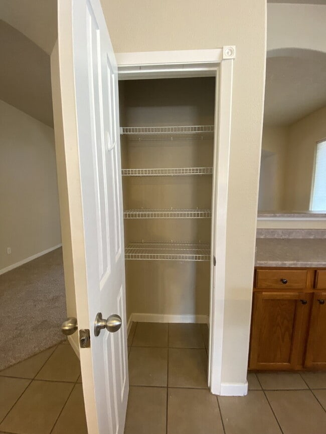 Building Photo - Spacious- 2 Living Rm/3BR/2Bath in Cabezon