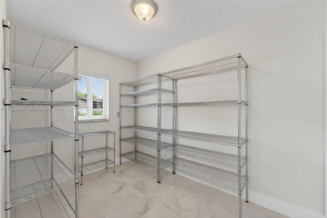 Building Photo - 8695 SW 51st Pl