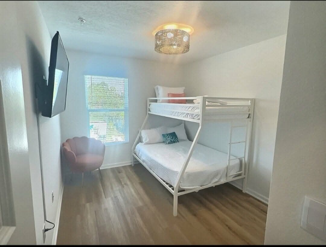 2nd guest bedroom with twin over full bunk bed and 50” tv - 4209 Lost Bay Dr