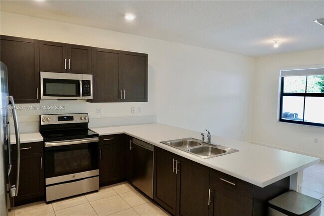 Building Photo - 10606 West 33rd Ct