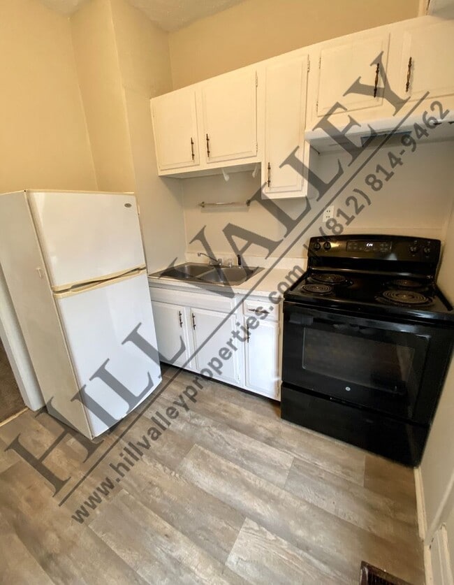 Building Photo - Two Bedroom Bungalow - East Side Location