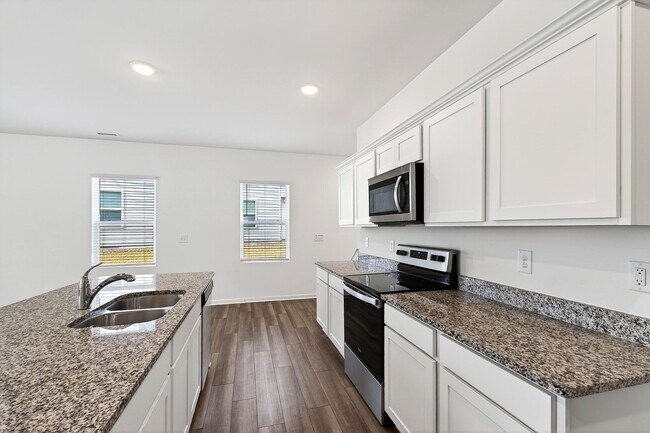 Building Photo - Charming 3BR End-Unit Townhome in Wake Forest!