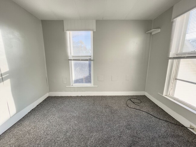 Building Photo - Downtown Home with fence and nice updates ...
