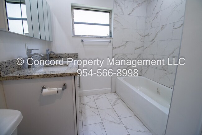 Building Photo - Holiday Special-Updated 2 BR- Open Layout- Island Kitchen-Pool- Central AC