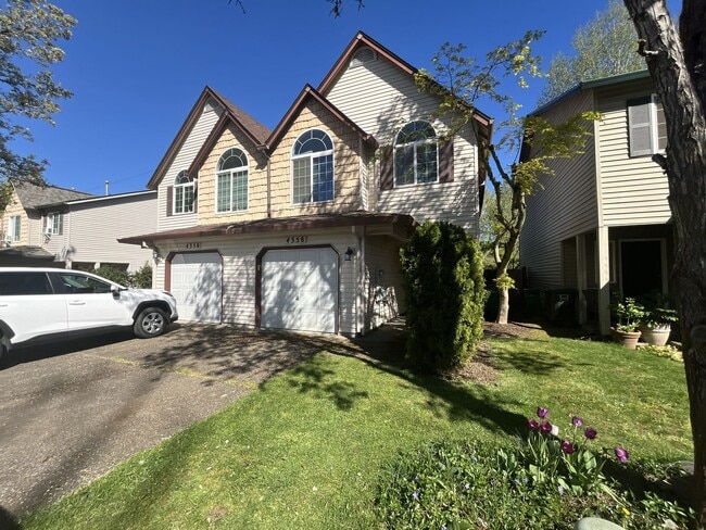 Building Photo - Spacious 3 Bedroom Home with Open Layout, Vaulted Bedrooms & Trail Access