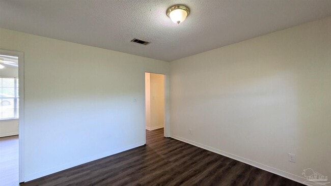 Building Photo - 6942 Falcon Dr
