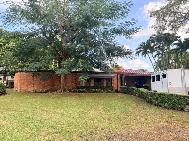 Building Photo - 5877 SW 123rd Ave