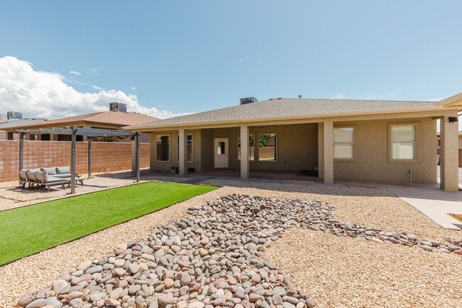 Building Photo - Meticulously kept 4 bedroom home with RV Parking/Hook ups