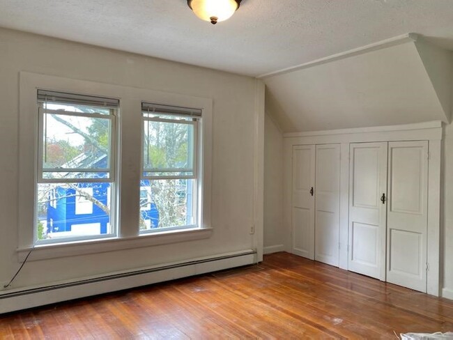 Living Room with closet storage space. - 16 Eames St