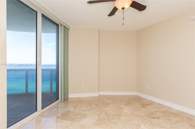 Building Photo - 17201 Collins Ave