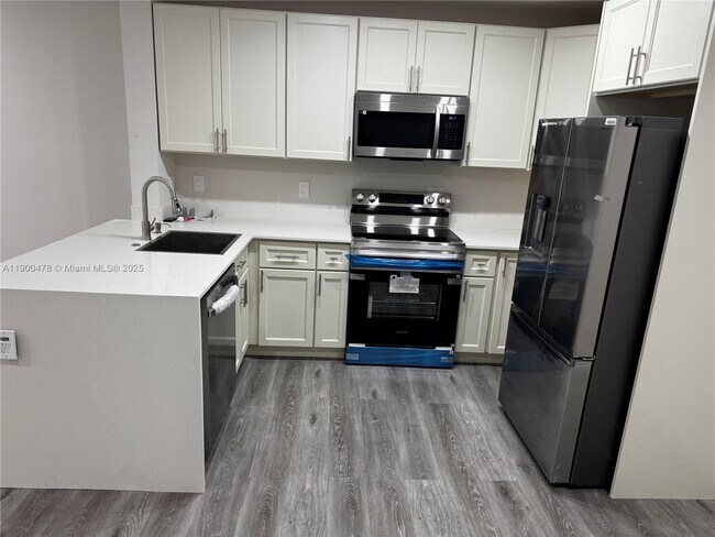 Building Photo - 3292 NW 104th Ave