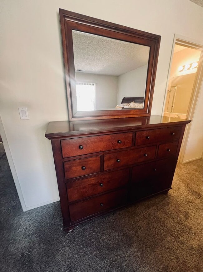 Building Photo - Affordable Comfort in 55+ Guard-Gated Comm...