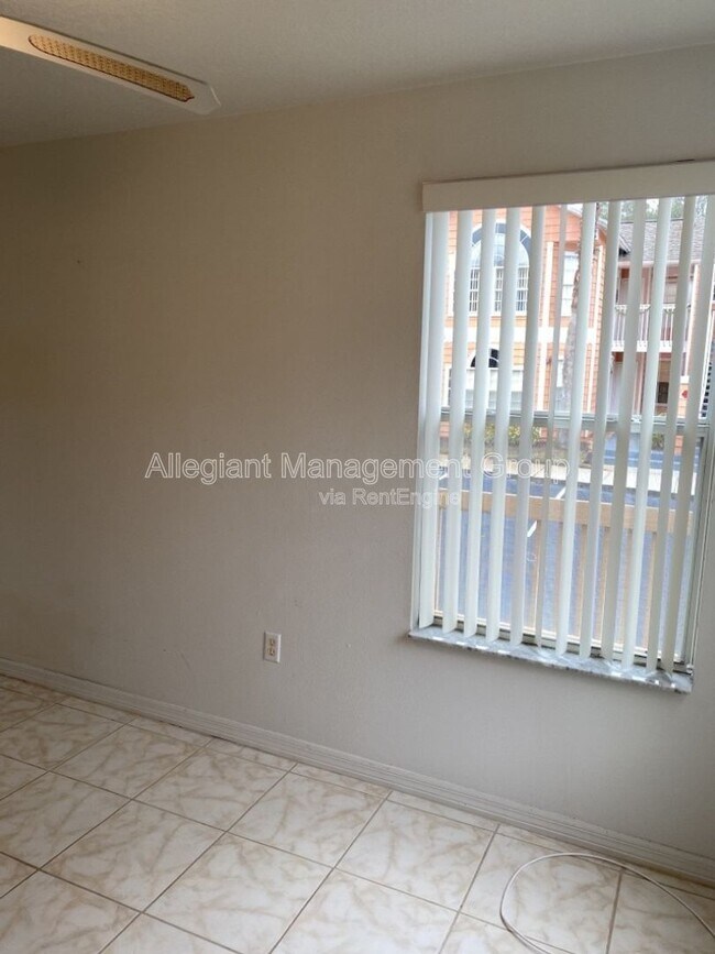 Building Photo - 8722 Rain Forest Pl